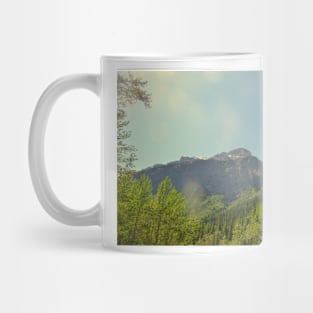 Sun flares over the Mountains Mug